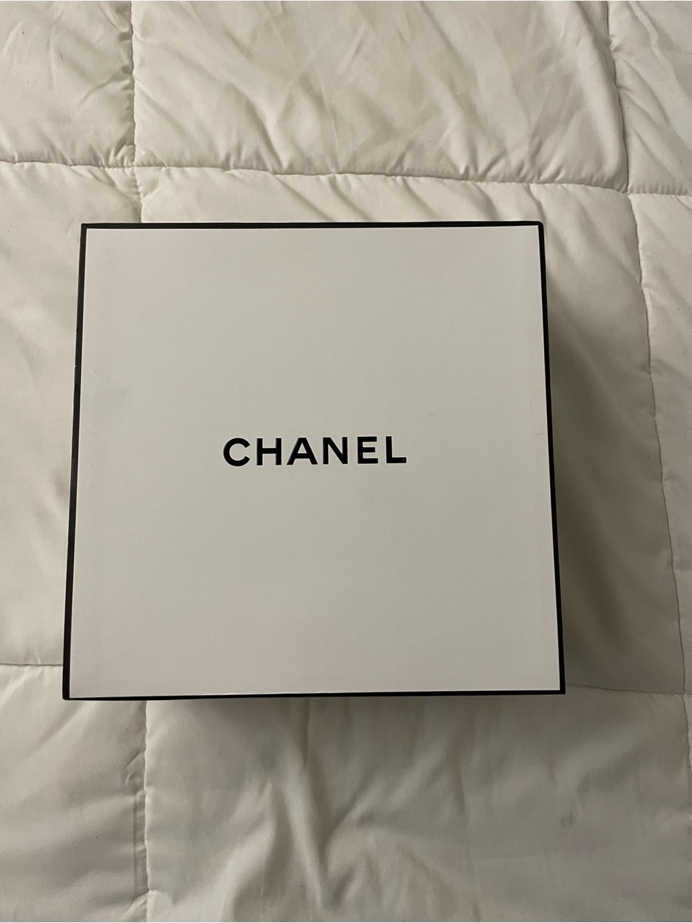 CHANEL Box with Black Logo and Trim